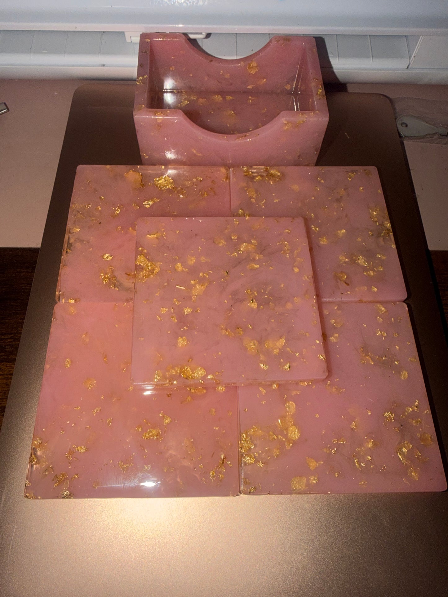 Square pink with gold flake epoxy coasters with holder
