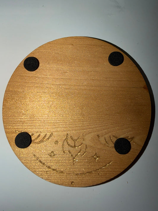 Circular wooden Aries pattern coaster